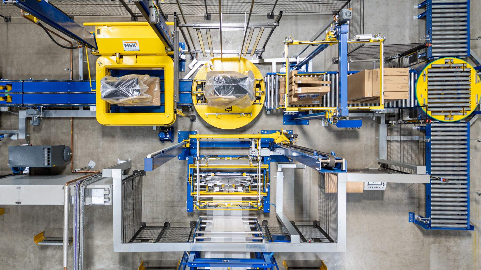 Système de rétraction de housses entièrement automatisé.